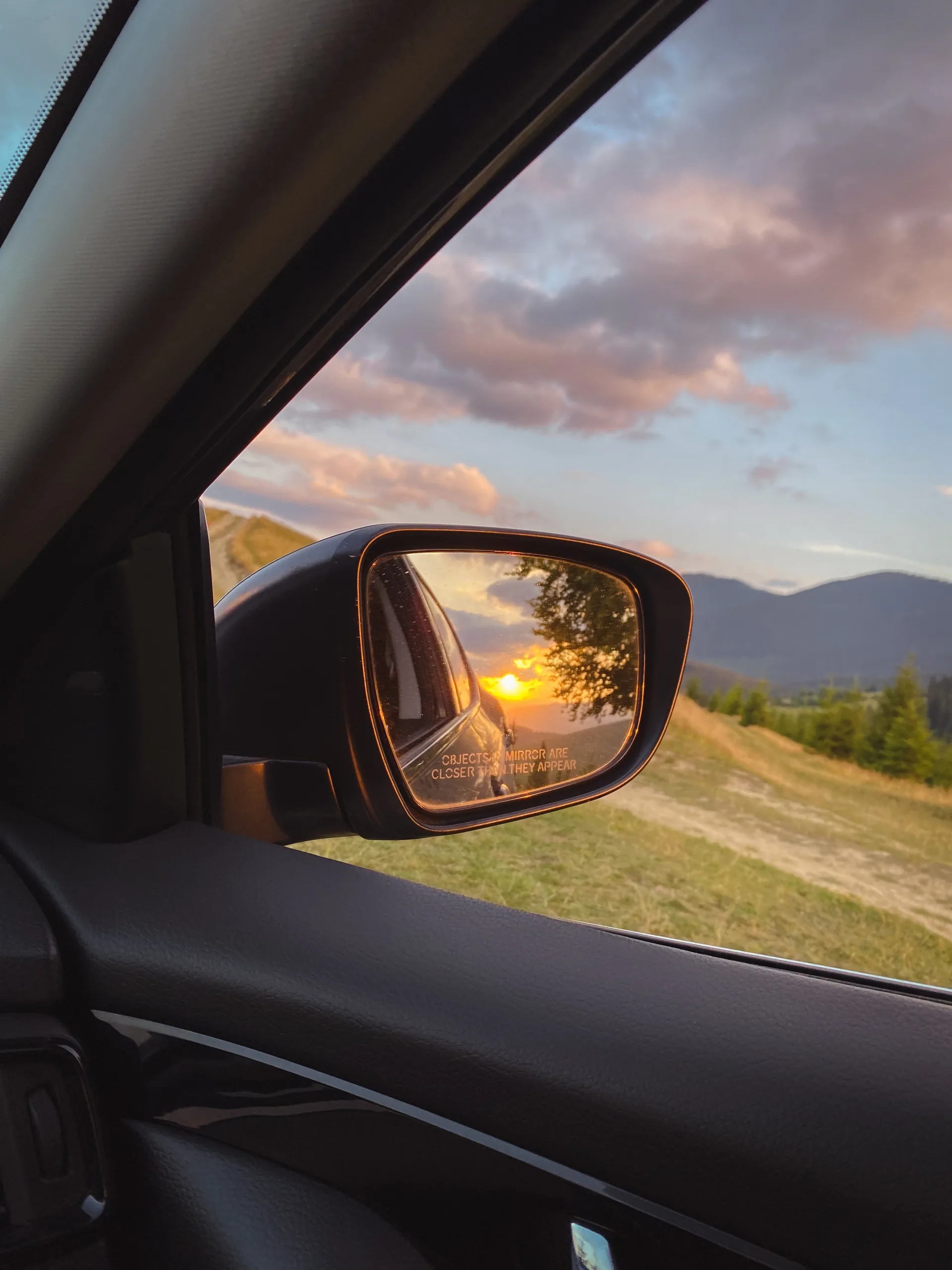 The road seen from inside a private transfer vehicle in Panama at last light